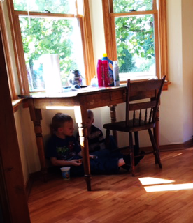 boys-under-table